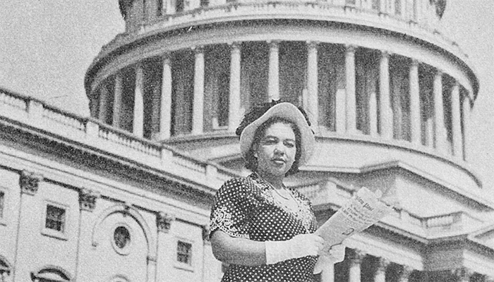 Alice Dunnigan in front of the Capitol Building