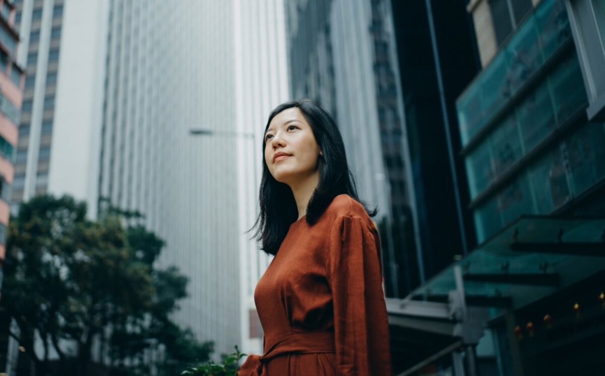 Woman in city landscape