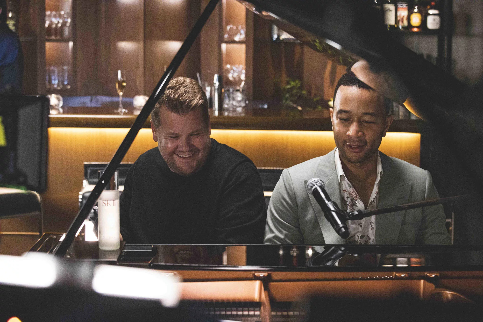 James Corden and John Legend at a piano