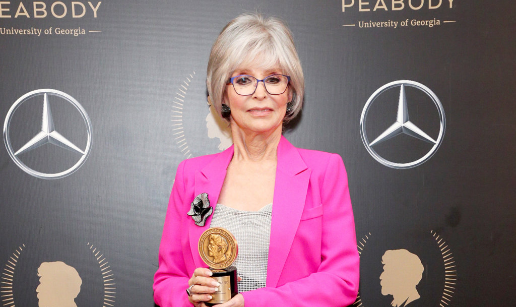 Rita Moreno holding Peabody Award; Credit: Astrid Stawiarz/Getty